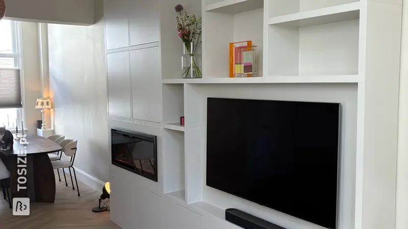 Stylish TV cabinet with fireplace for the living room, by Stijn