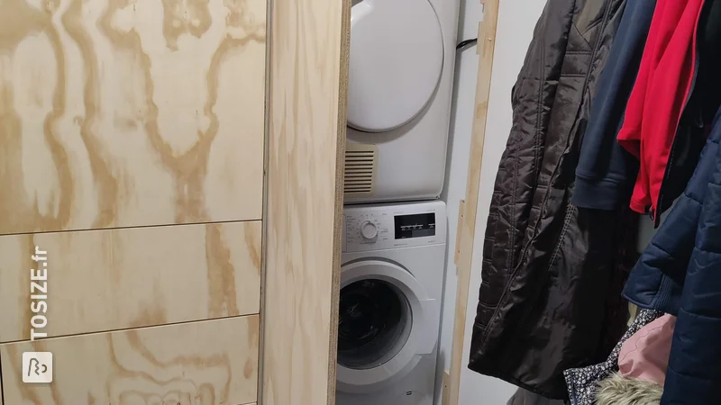 Transformation d'une buanderie avec un mur de placard sous-couche pratique, par Ben