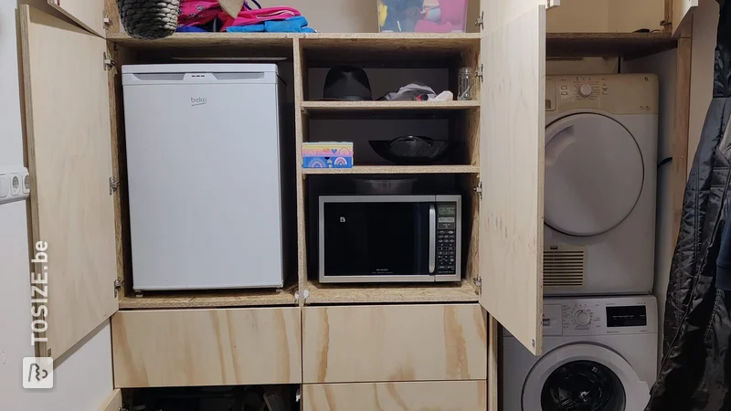 Utility room transformation with practical underlayment cupboard wall, by Ben