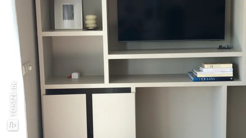 Custom made living room shelving unit by Joost