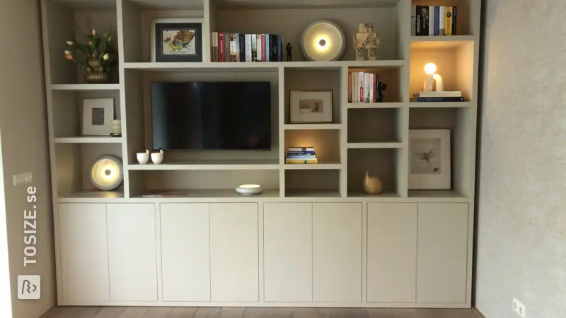 Custom made living room shelving unit by Joost