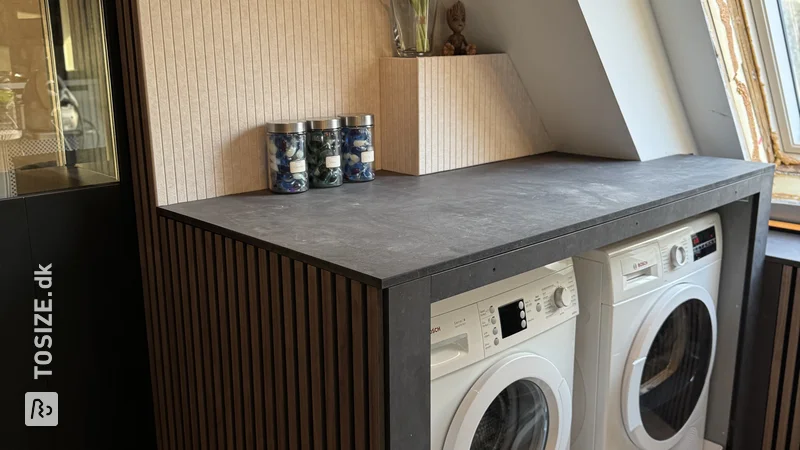 Stylish laundry room with washing machine conversion and windowsill, by Robin