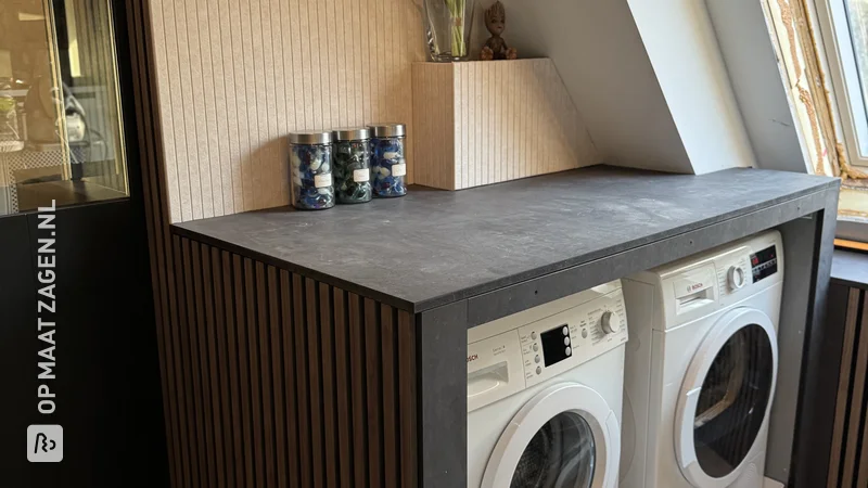 Stylish laundry room with washing machine conversion and windowsill, by Robin