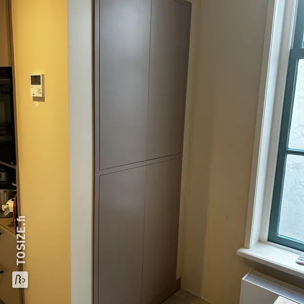 Beige cabinet with doors and shelves