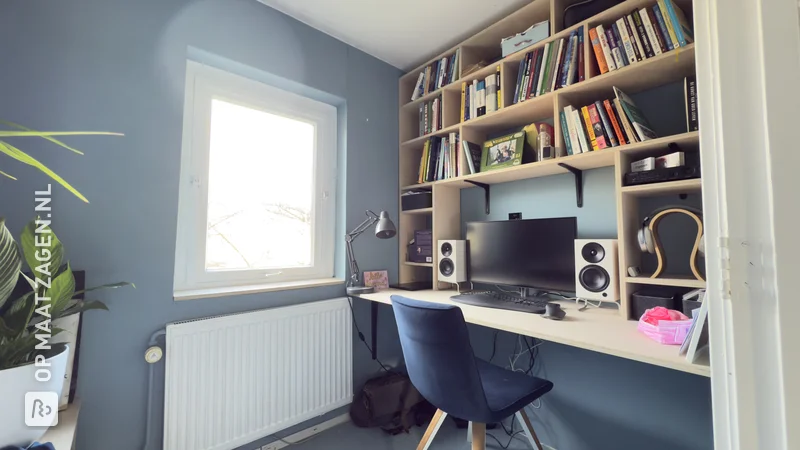 Desk with bookcase made of plywood, by Pieter