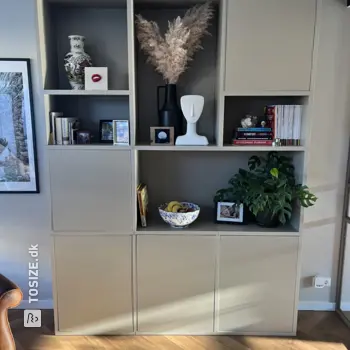 Elegant gray shelving unit with lots of storage space, by Jasper