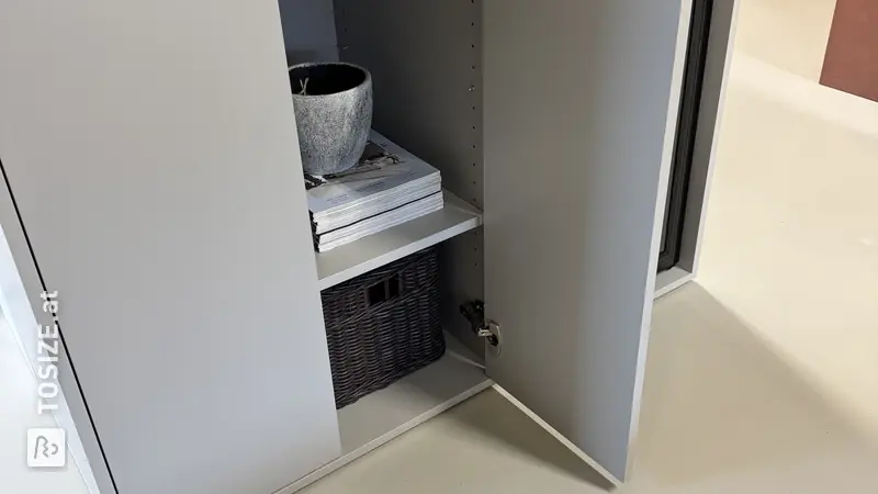 Cloud grey coffee cabinet for the showroom, by Laura