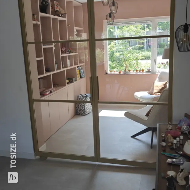 White cupboard wall with open compartments and doors