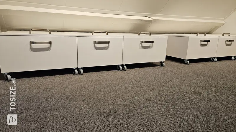 Rolling Storage Cabinets Under Low Wall, by Sijbrand
