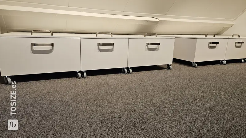Rolling Storage Cabinets Under Low Wall, by Sijbrand