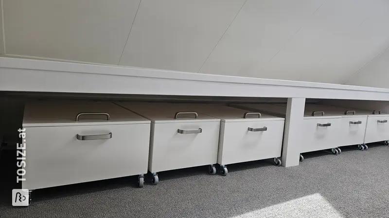 Rolling Storage Cabinets Under Low Wall, by Sijbrand