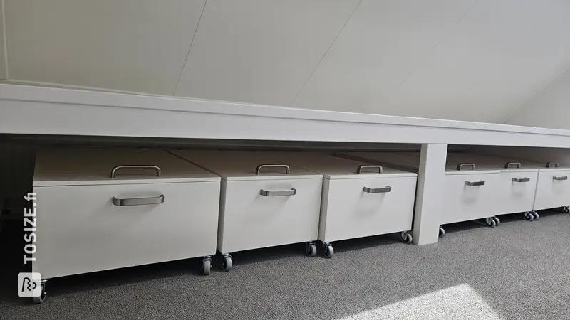 Rolling Storage Cabinets Under Low Wall, by Sijbrand