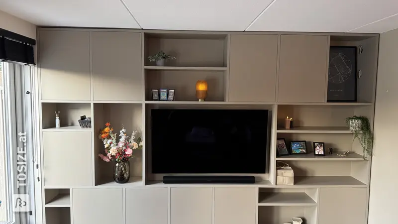 Wall-filling TV cabinet for the living room, by Marley