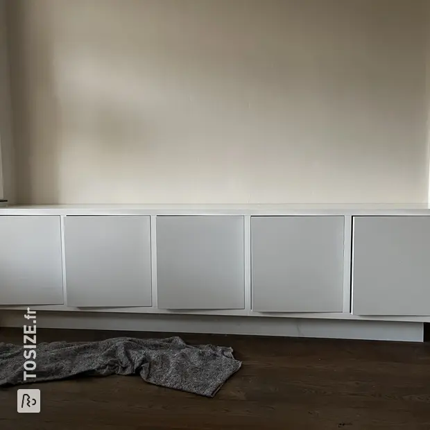 White sideboard with doors and open compartments