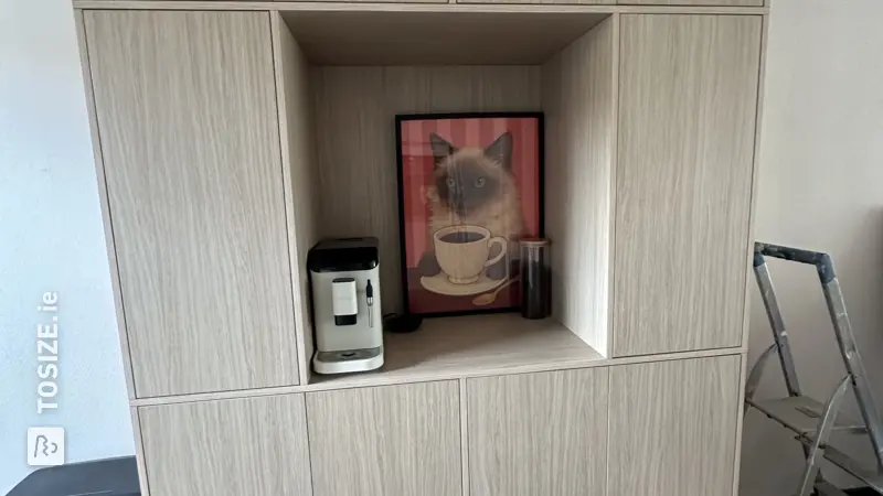 Stylish kitchen cabinet with coffee corner in natural oak structure, by Manon