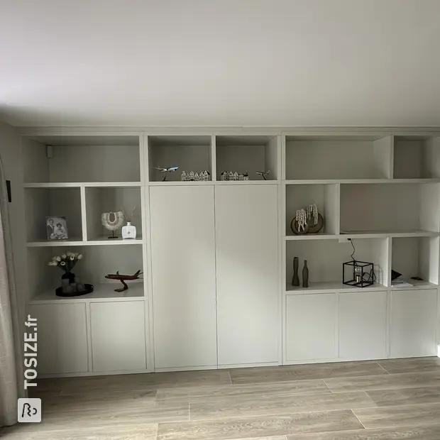Gray cabinet with doors and open compartments