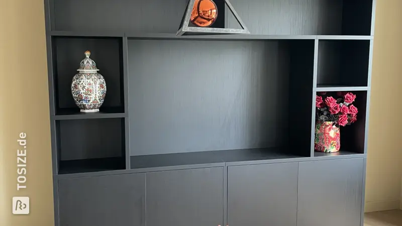 Stylish TV cabinet and shelving unit for the living room, by Imke