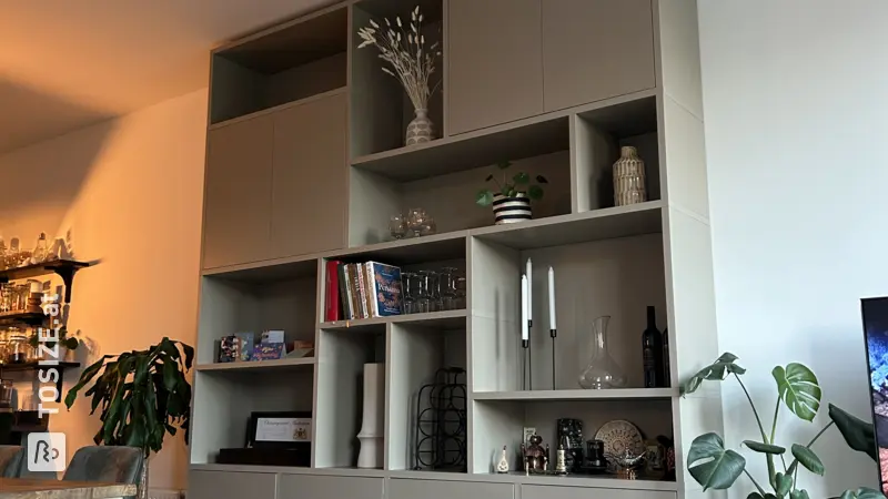 Tall wall cupboard in dark ecru, by Ruud