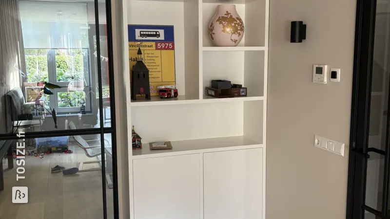 Stylish white wall cupboard for the living room, by Francien
