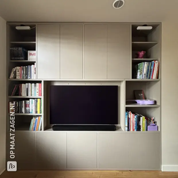 Cream cupboard wall with open compartments and doors