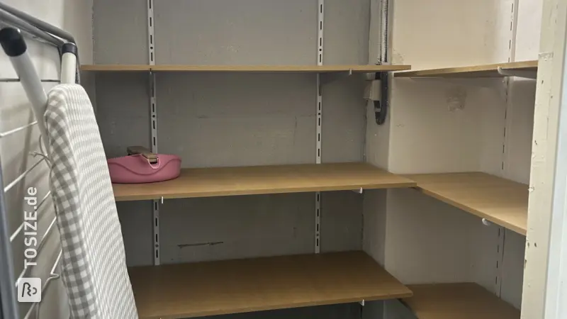 Basement cupboard with storage space and shelves, by Maud