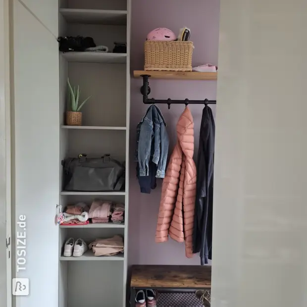 Gray shoe cabinet with open compartments and doors