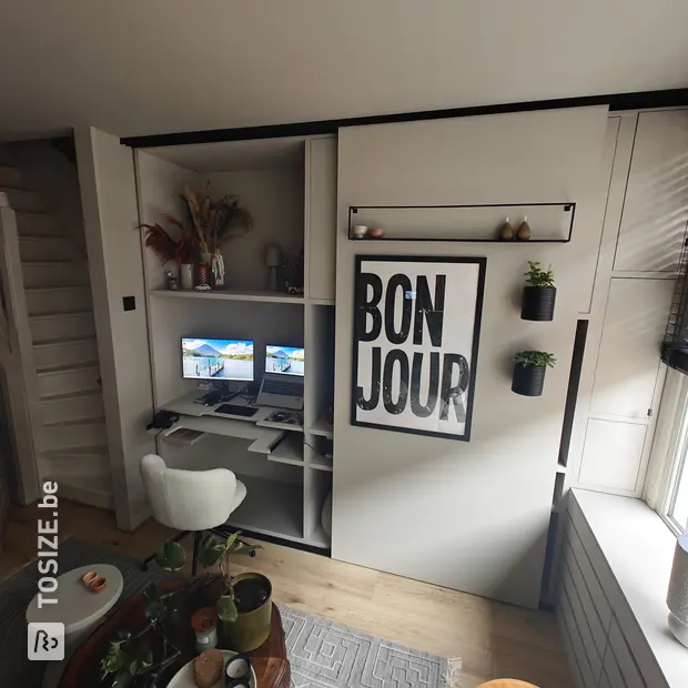 Cream cabinet with doors and open compartments