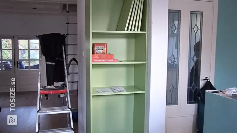 Built-in cupboard for the kitchen and living room in Gamma Spring Moss, by Sophie