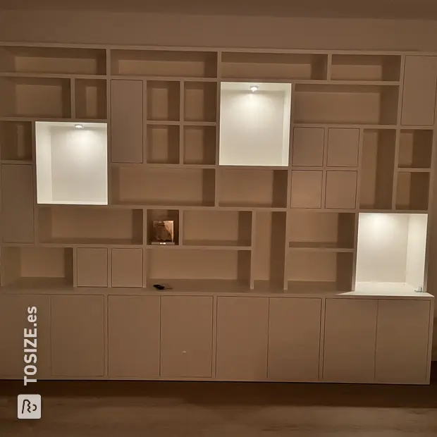White cabinet with doors and open compartments