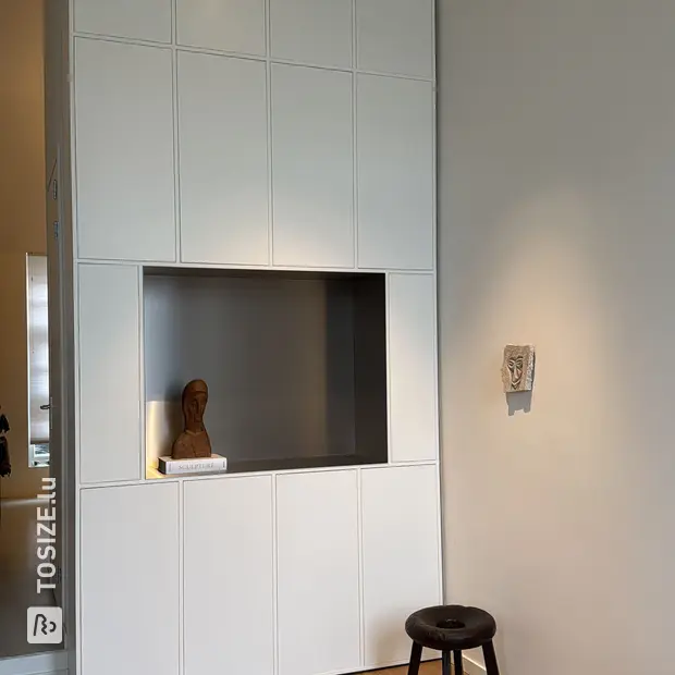 White cabinet with open shelves and doors