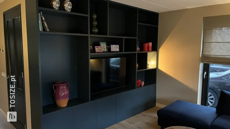 Stylish Dark Blue TV and Shelving Unit in the Living Room, by Joris
