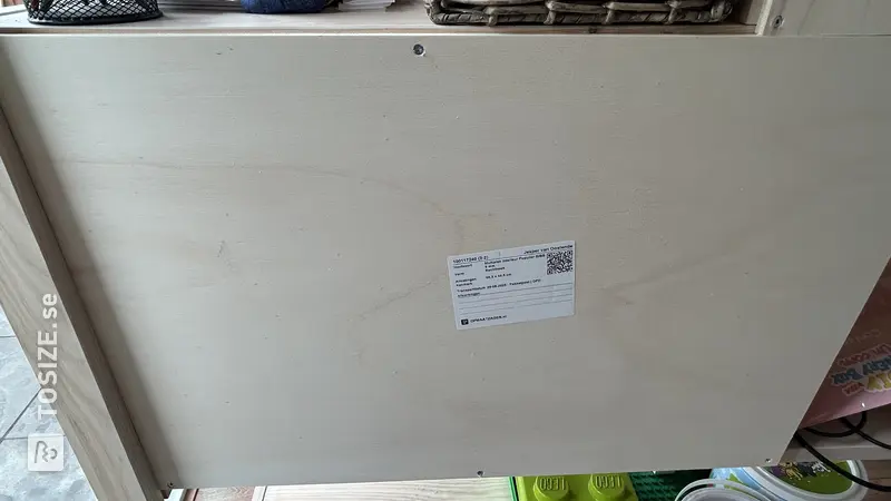 Closing the back of the wall cupboard, by Jesper