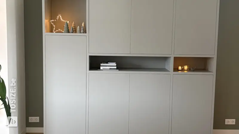 Custom-made living room cupboard with plenty of storage space, by Marlou