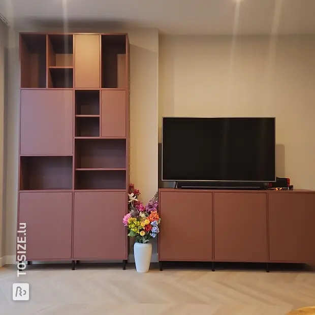 Brown cupboard wall with open compartments and doors