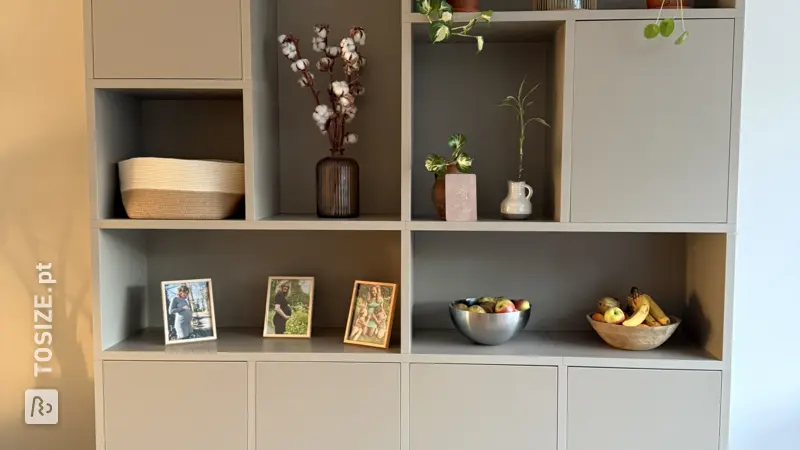 Stylish beige bookcase in the living room, by Gitta