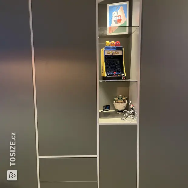 Gray cabinet with doors and open compartments