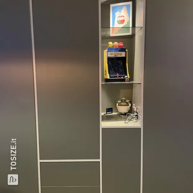 Gray cabinet with doors and open compartments