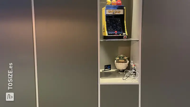 Custom built-in wardrobe with push-open drawers, by Jan and Susan