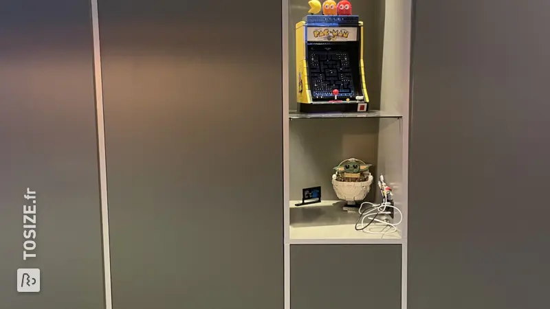 Custom built-in wardrobe with push-open drawers, by Jan and Susan