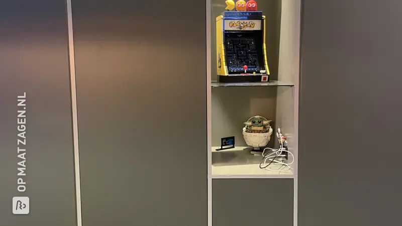 Custom built-in wardrobe with push-open drawers, by Jan and Susan