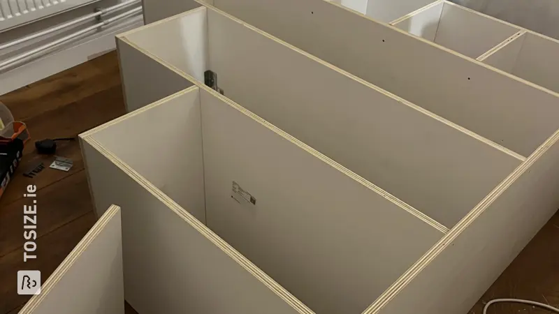 Wardrobe Stair Combination: A Creative Shelving Unit by Annemieke