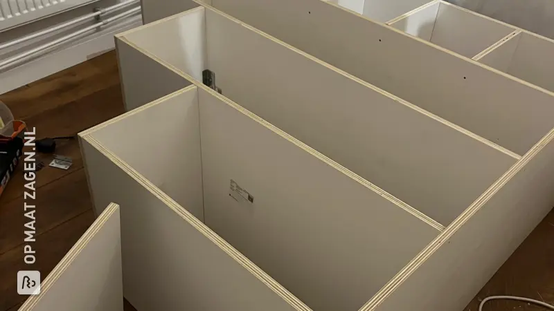 Wardrobe Stair Combination: A Creative Shelving Unit by Annemieke