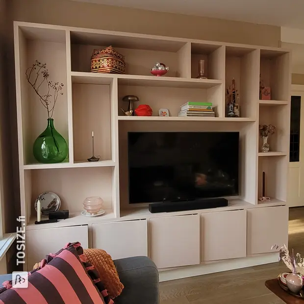 Cream cupboard wall with open compartments and doors