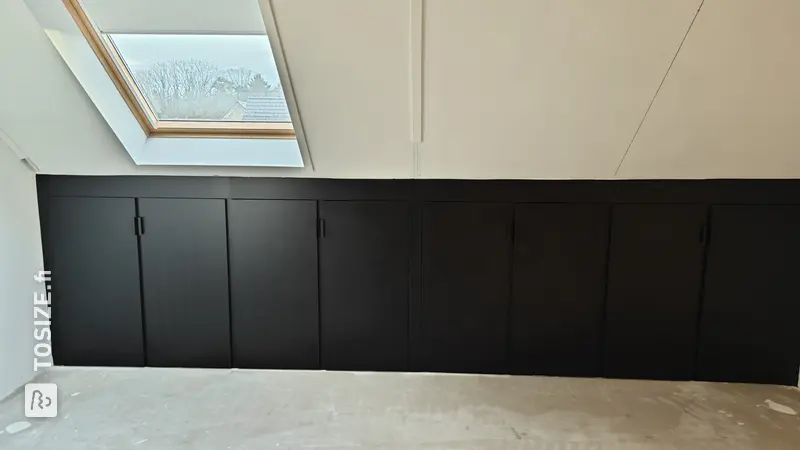 Black built-in cupboard in the attic knee wall, by Ralph