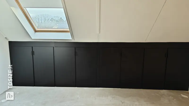 Black built-in cupboard in the attic knee wall, by Ralph