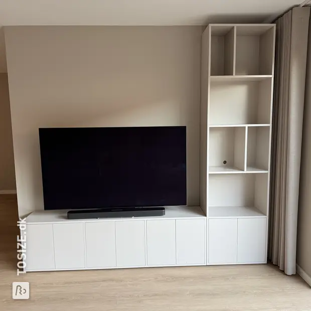White sideboard with doors and open compartments