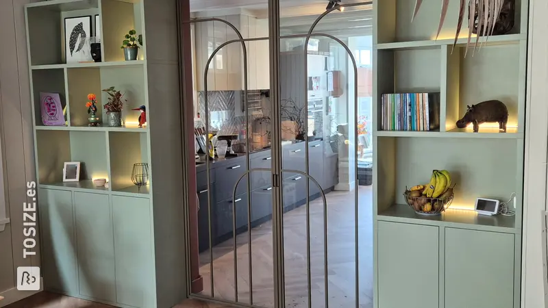 Stylish ensuite wardrobe with sliding doors and light bar, by Chris
