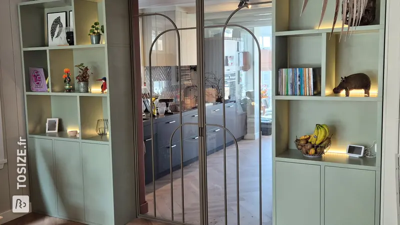 Stylish ensuite wardrobe with sliding doors and light bar, by Chris