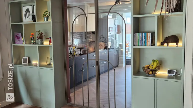 Stylish ensuite wardrobe with sliding doors and light bar, by Chris