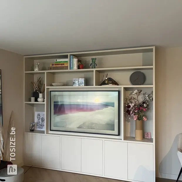 White cupboard wall with open compartments and doors